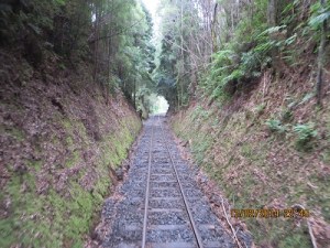 Note the narrow cutting, men and wheel barrows, no heavy machinery